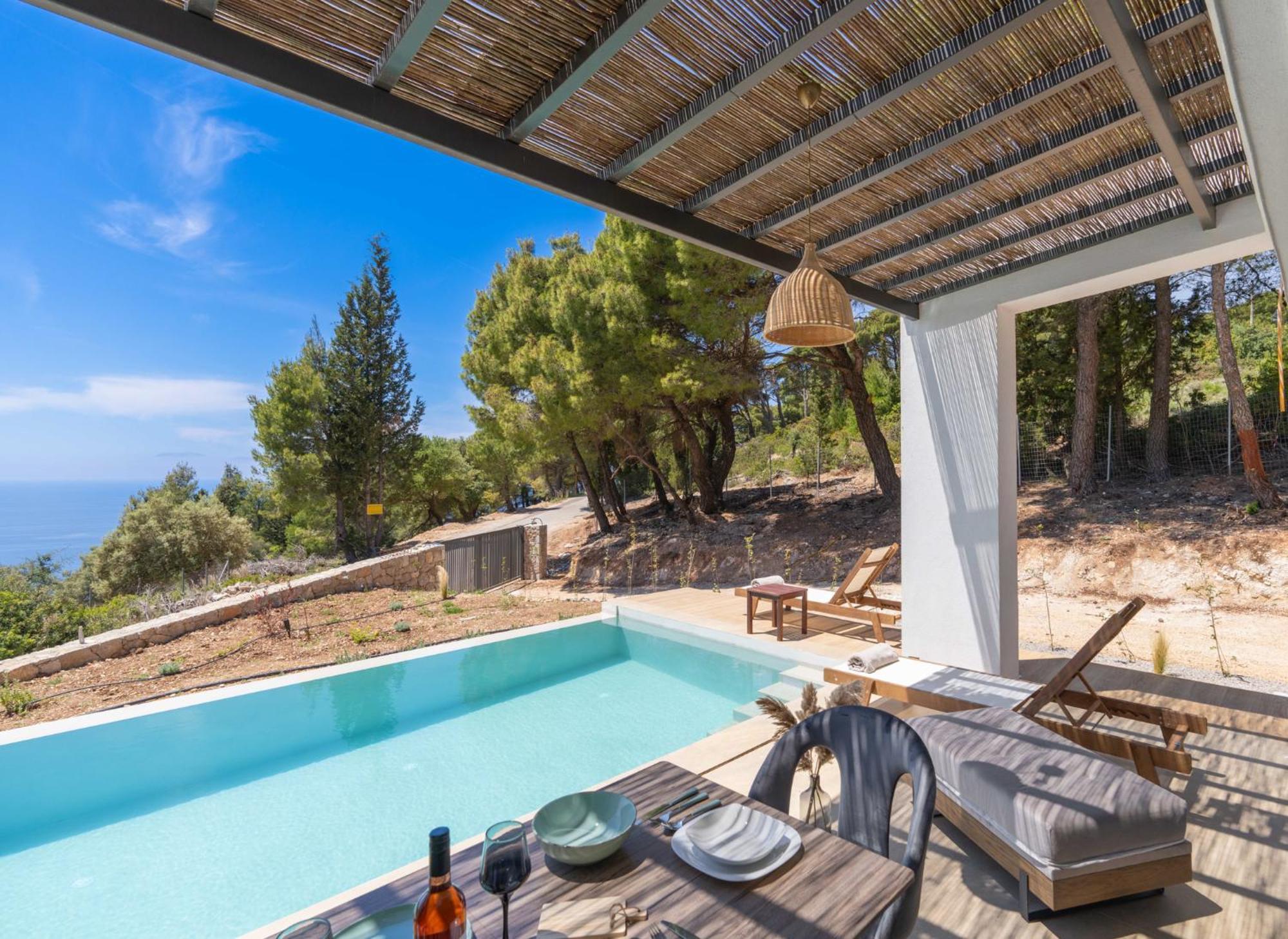 Mellamare Luxury Suites Athánion 外观 照片